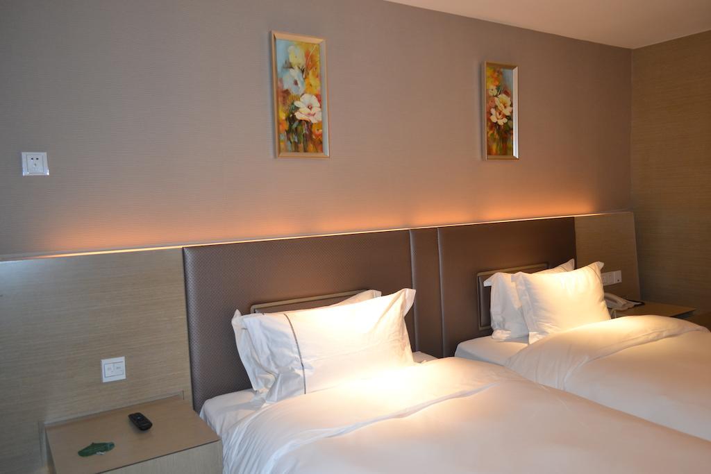 Angel Garden Hotel Hohhot Rom bilde